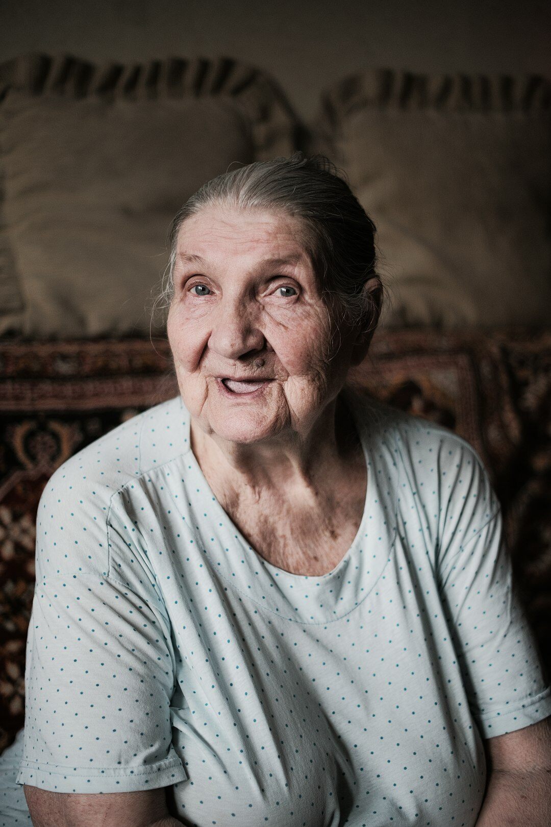 Portrait of a smiling senior woman with short grey hair